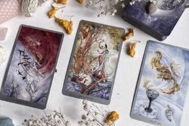 tarot cards on white surface