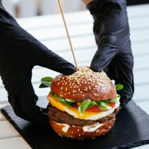 selective focus photography of skewed cheeseburger