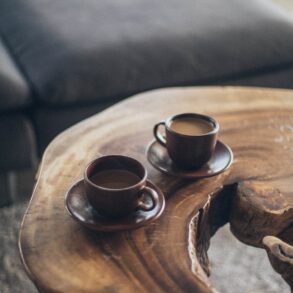 two brown ceramic mugs